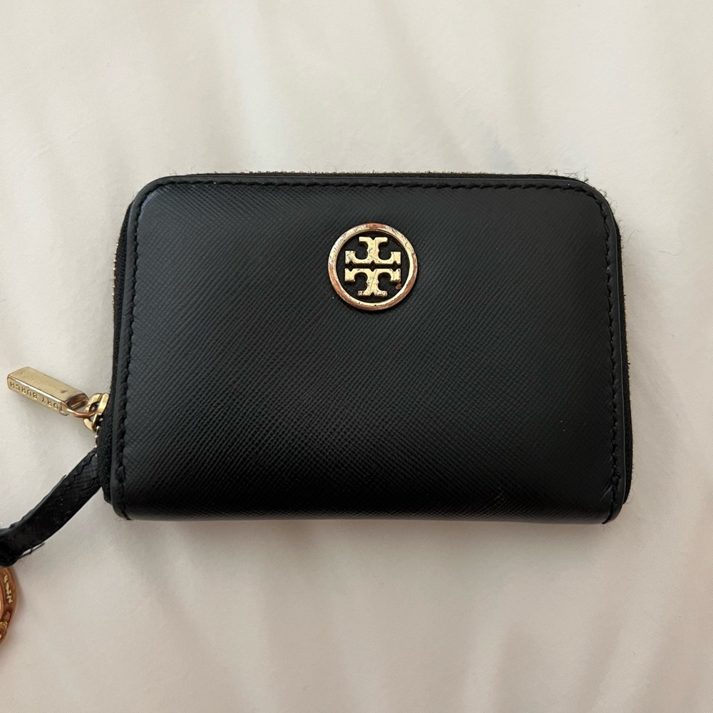 Tory Burch. Worn wallet fits so much and is perfect for everyday!!